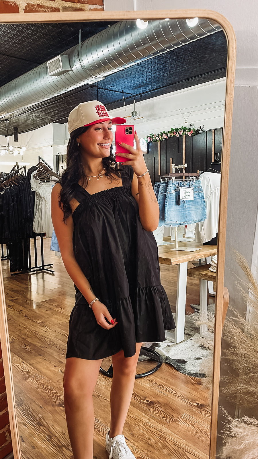 Black poplin sleeveless dress.