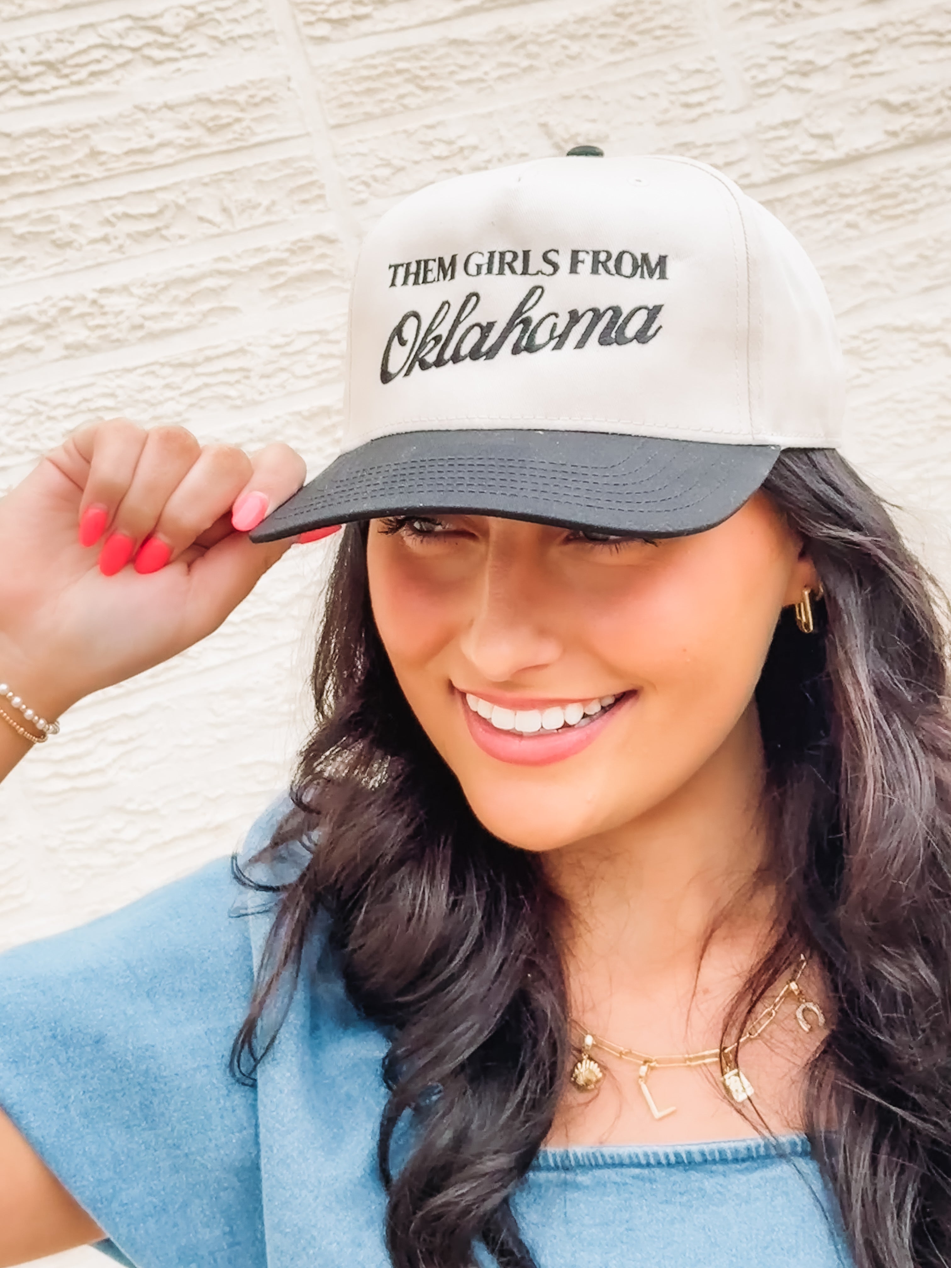 Black and cream canvas hat with 'Them girls from oklahoma' typography