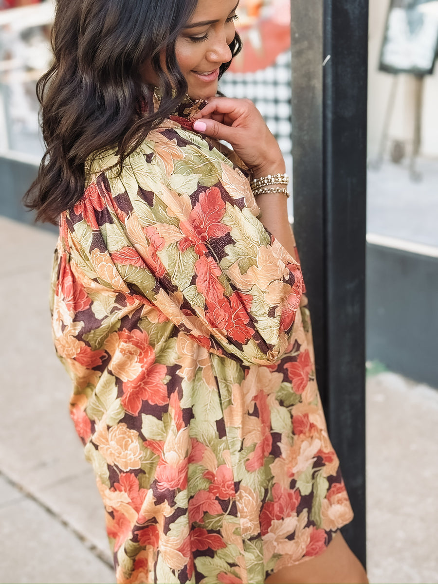 Leaf printed floral short sleeve v neck  mini dress.