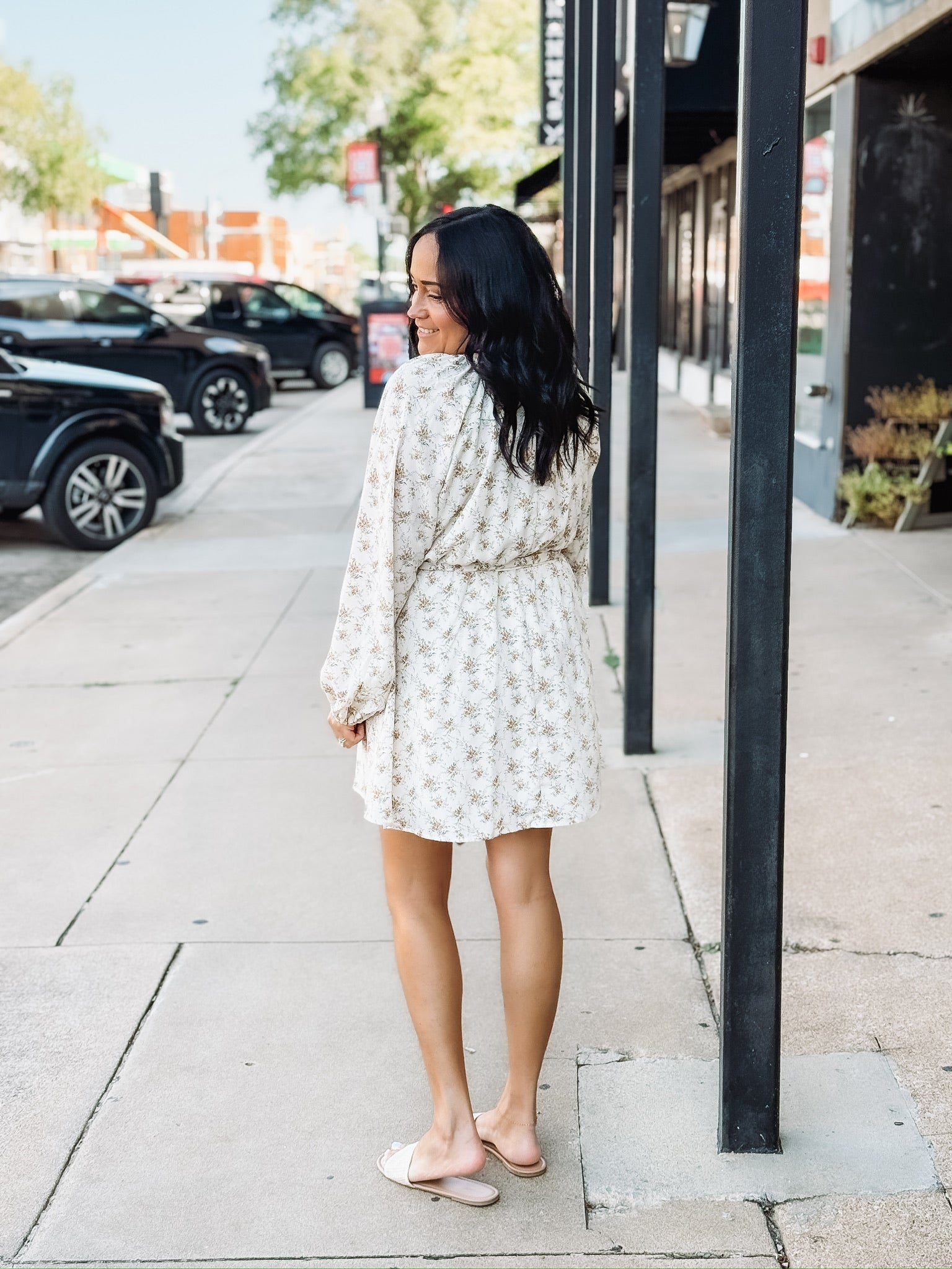 Yellow floral on a cream base long sleeve  tie waist long sleeve mini dress.