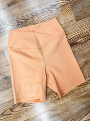 orange biker shorts