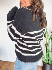 Black and white striped long sleeve sweater