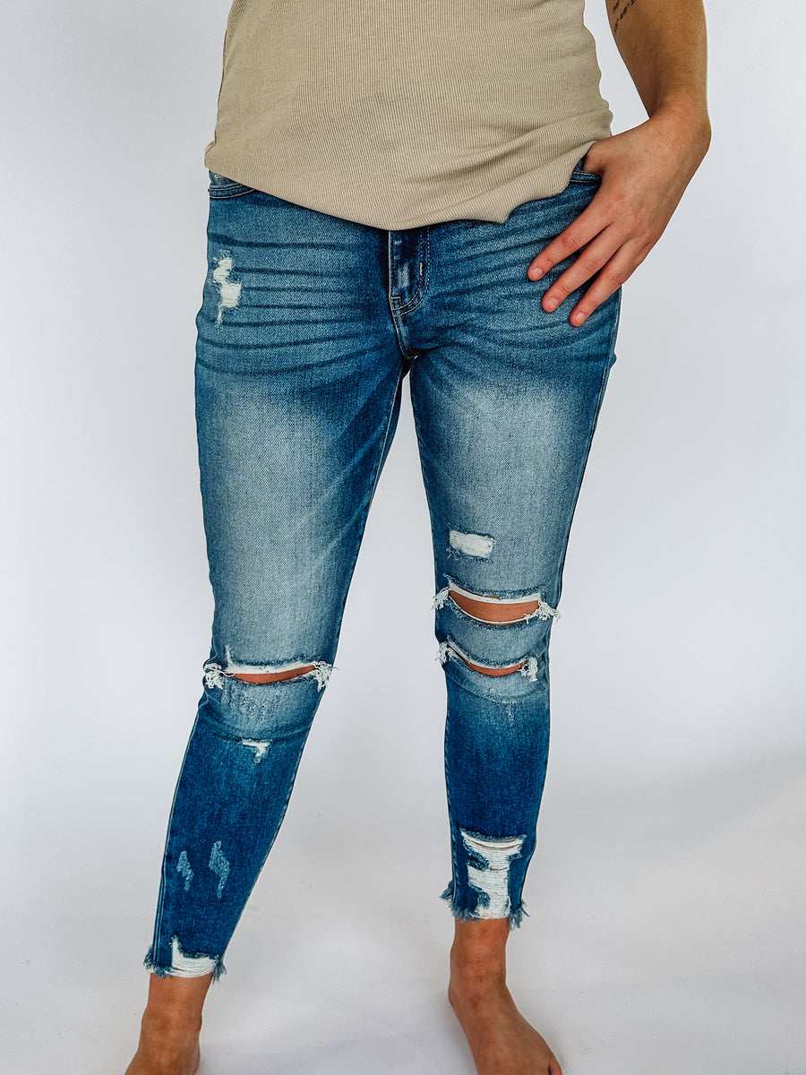 medium wash distressed skinny jeans