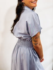 Light blue short sleeve, button up, midi dress.