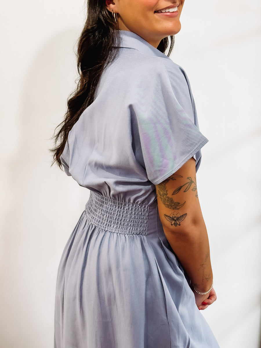 Light blue short sleeve, button up, midi dress.
