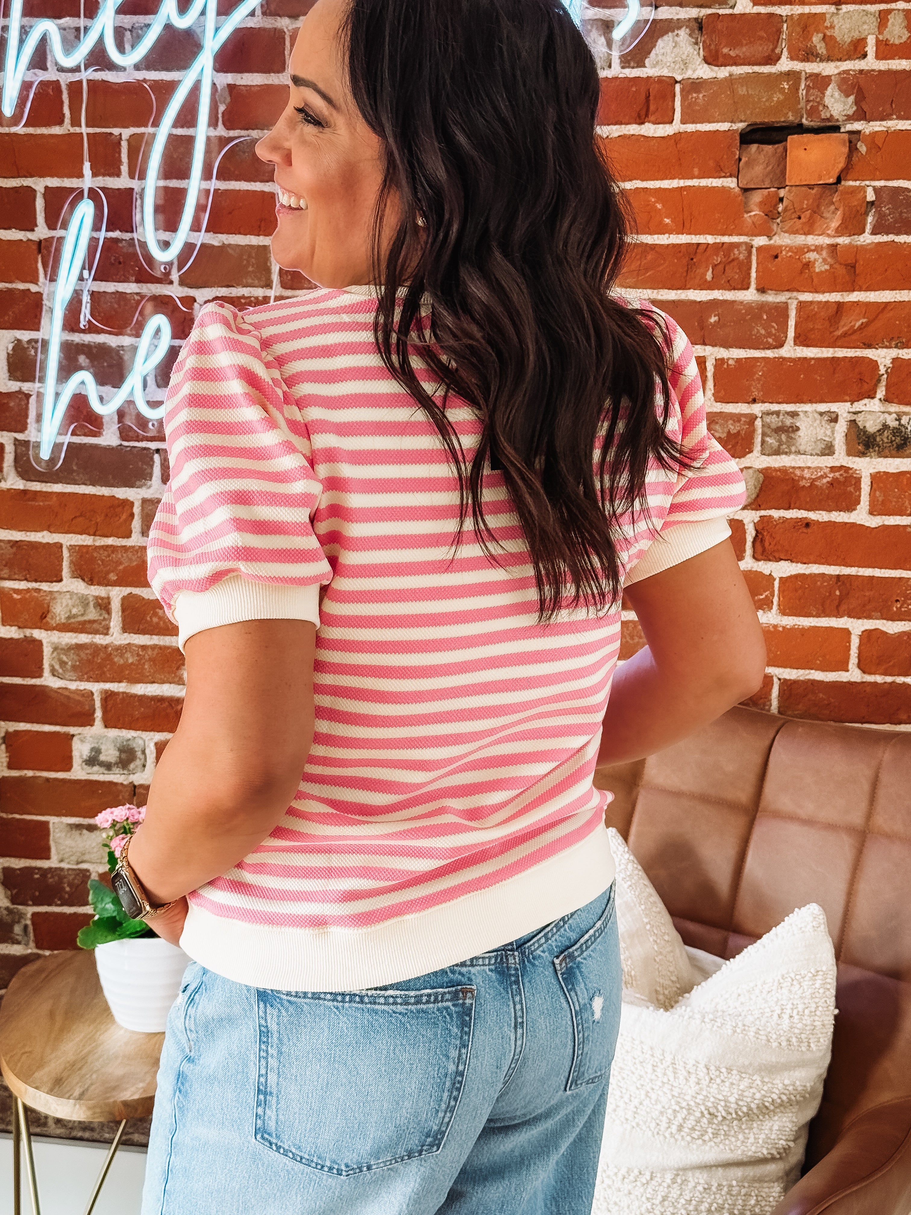 Pink and cream striped short sleeve top.