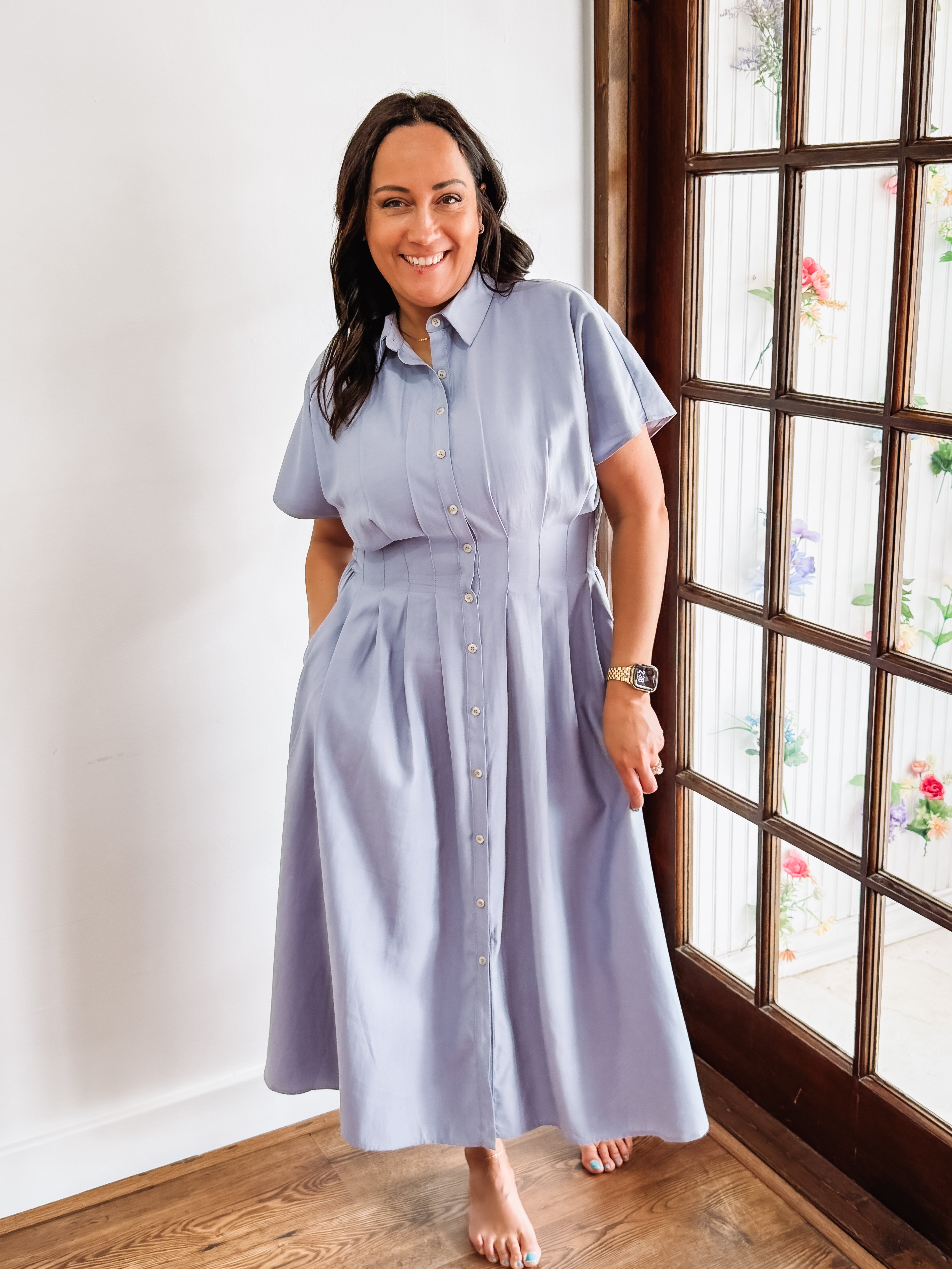 Light blue short sleeve, button up, midi dress.