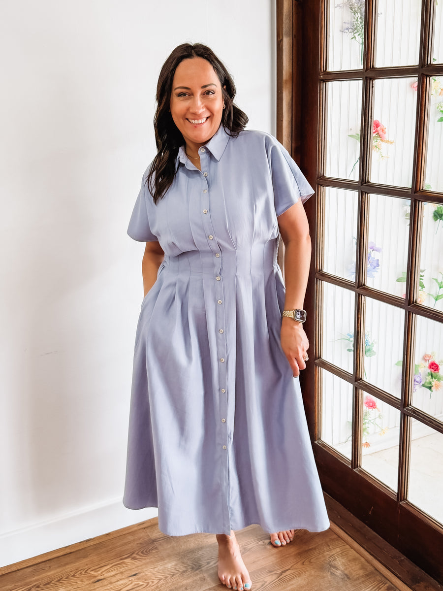 Light blue short sleeve, button up, midi dress.