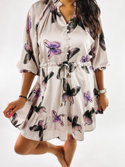 White dress with purple and black butterflies