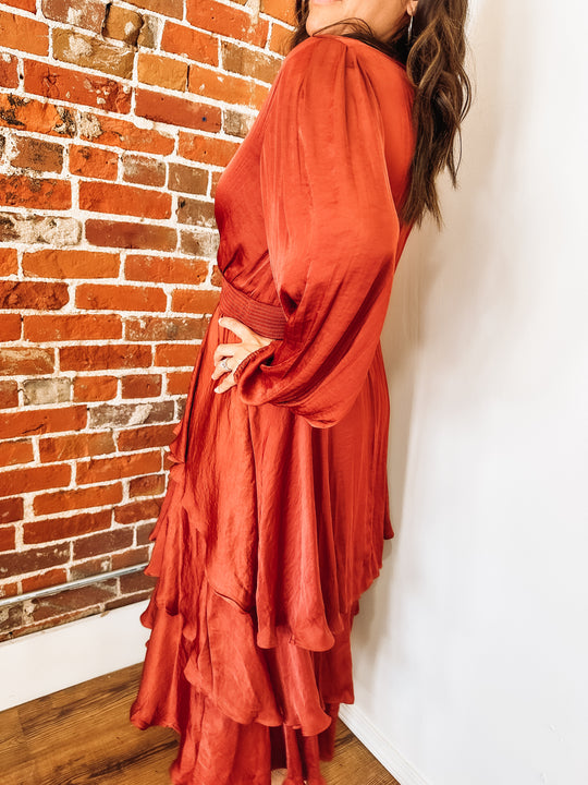 Long sleeve rust colored satin dress