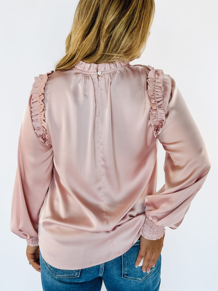 Rose colored ruffle detail blouse