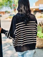 Black and cream horizontally striped sweater