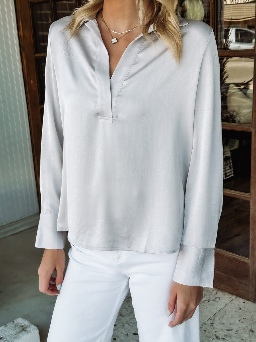 silver hued satin collared v-neck blouse