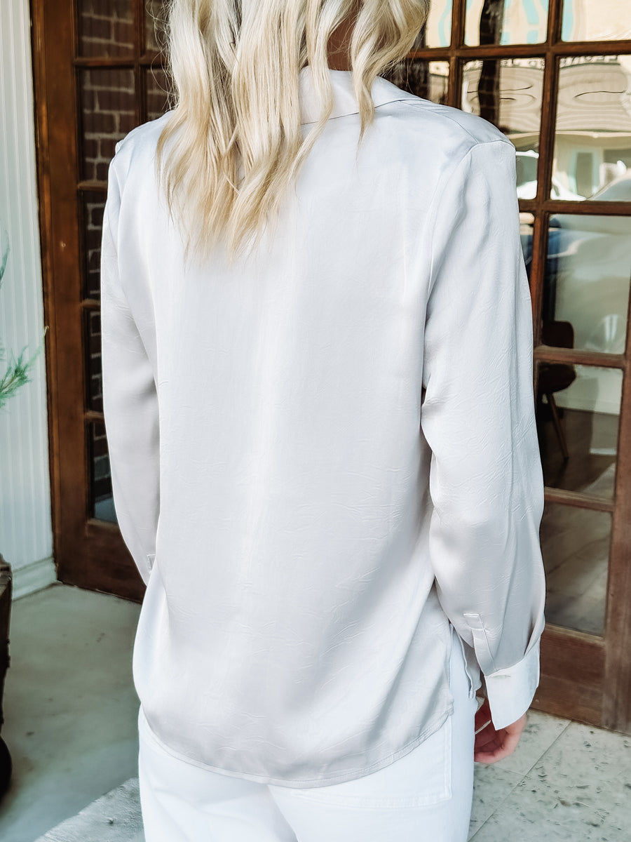 silver hued satin collared v-neck blouse