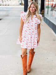 Orange and white OSU-themed toile dress with flutter sleeves, featuring a fitted waist and flowy silhouette.