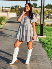 Black and white plaid tiered puff short sleeve mini dress.