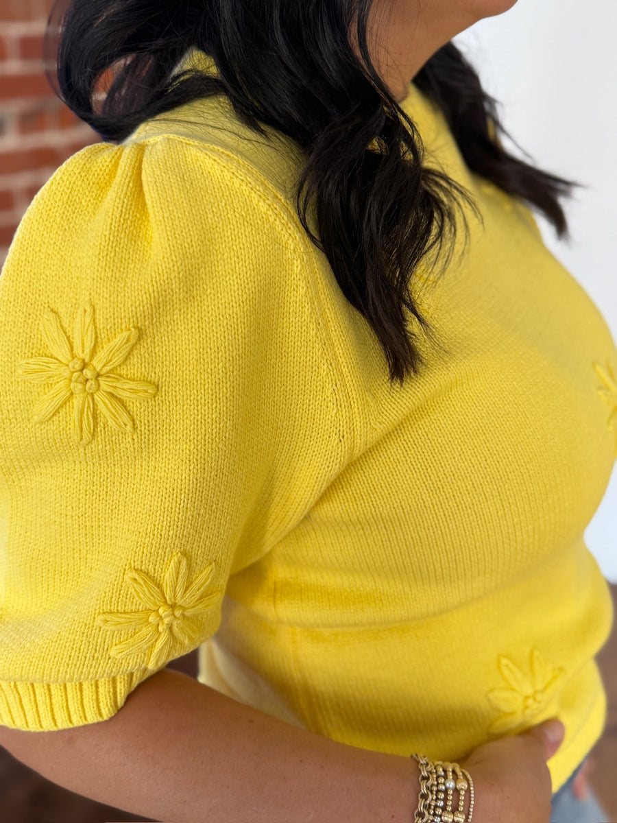 Short sleeve yellow embroidered floral sweater.