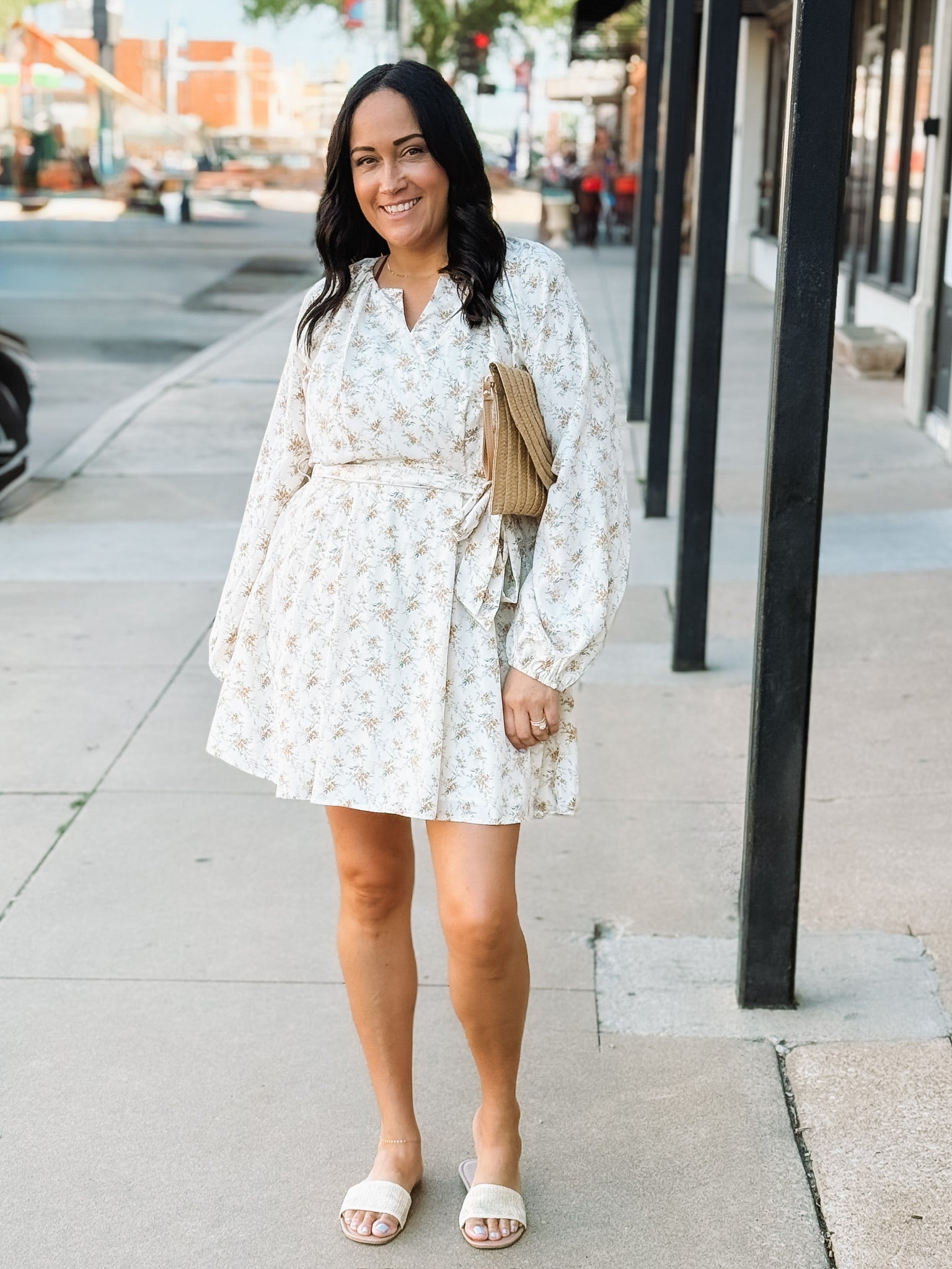 Yellow floral on a cream base long sleeve  tie waist long sleeve mini dress.