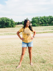 yellow graphic tee