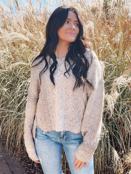 beige textured sweater